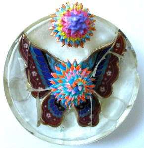 Leo Jean's Starlike© paper sculptures atop enameled butterfly in resin base 