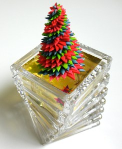 Leo Jean's Starlike© paper sculpture atop a layered crystal base