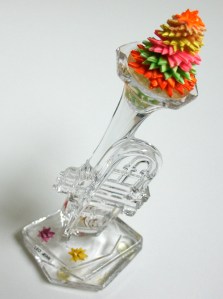 Leo Jean's Starlike© paper sculpture atop a crystal trumpet