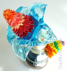 Leo Jean's Starlike© paper sculptures mounted on turquoise flower glass base
