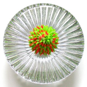 Leo Jean's Starlike© paper sculpture atop glass base