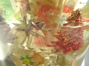 A variety of Leo Jean's Starlike© paper sculptures embedded in clear resin